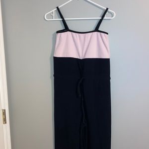 black and pink sansha warmup jumpsuit